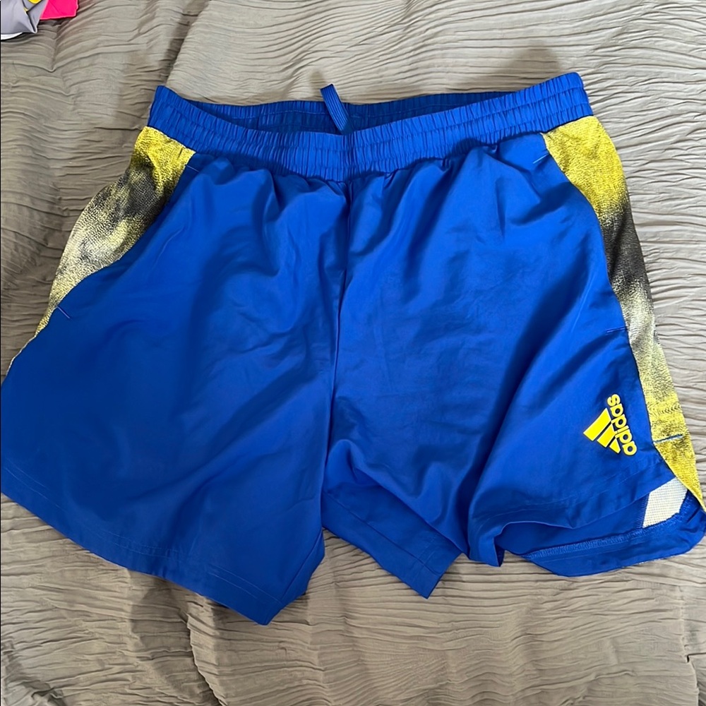 Adidas Royal Blue unlined running Shorts with Yellow Highlights. Worn once